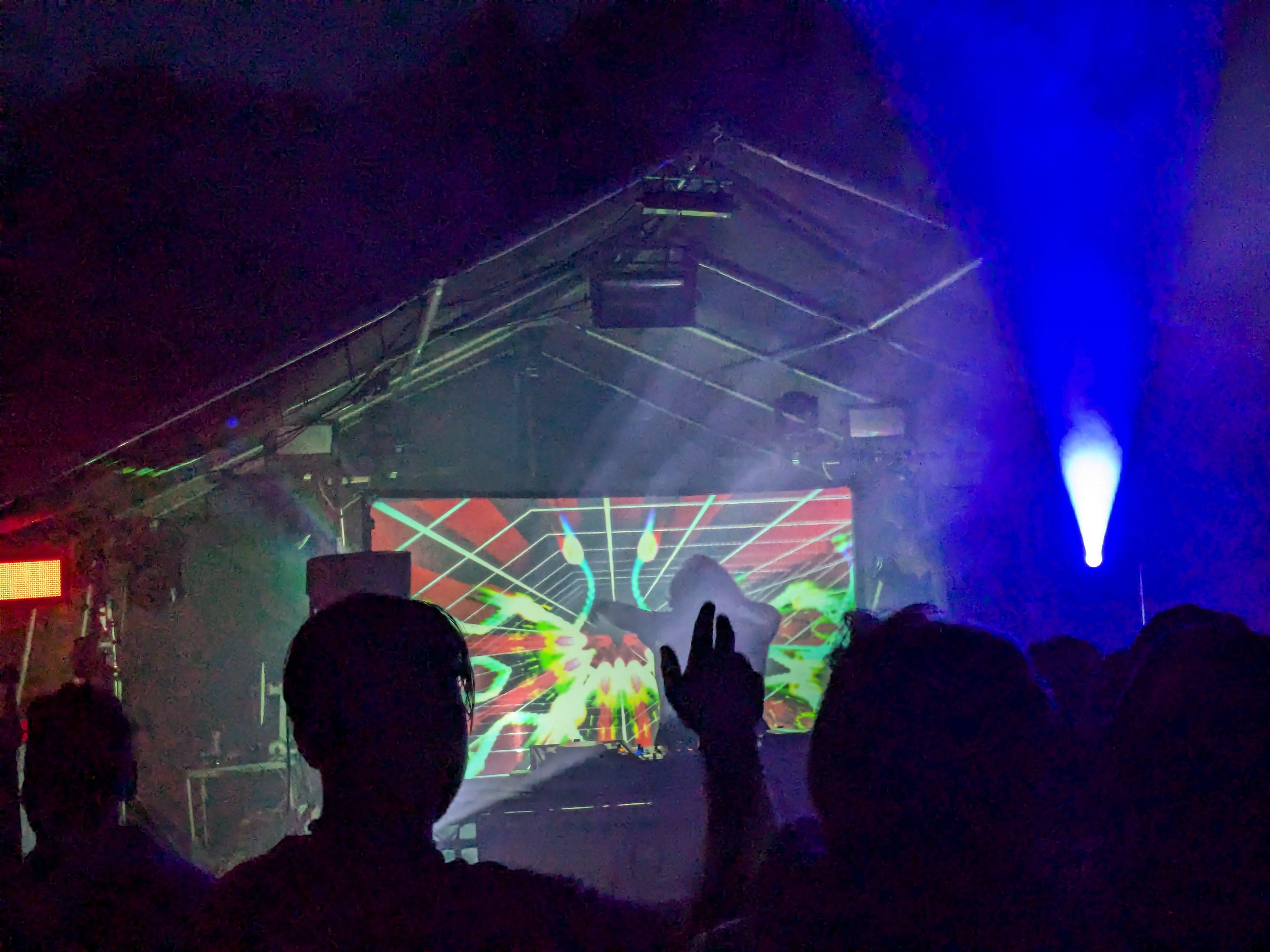 Overscan live visuals filling a performance space
