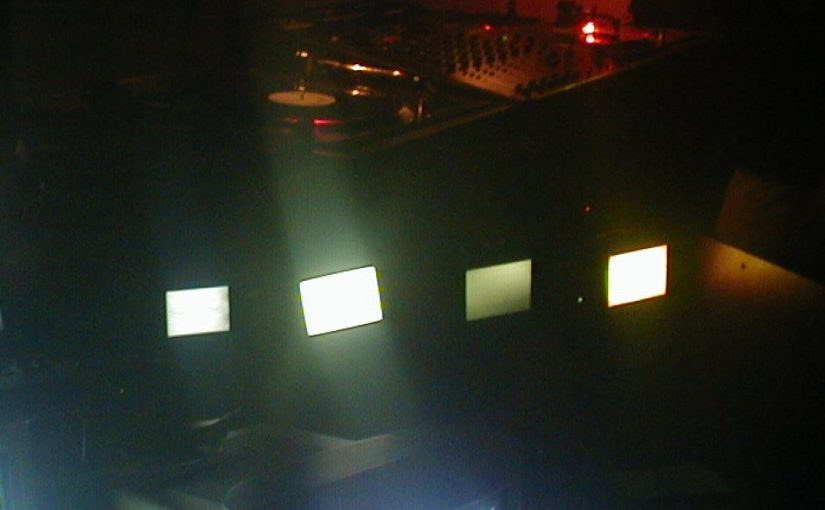 A row of illuminated screen objects